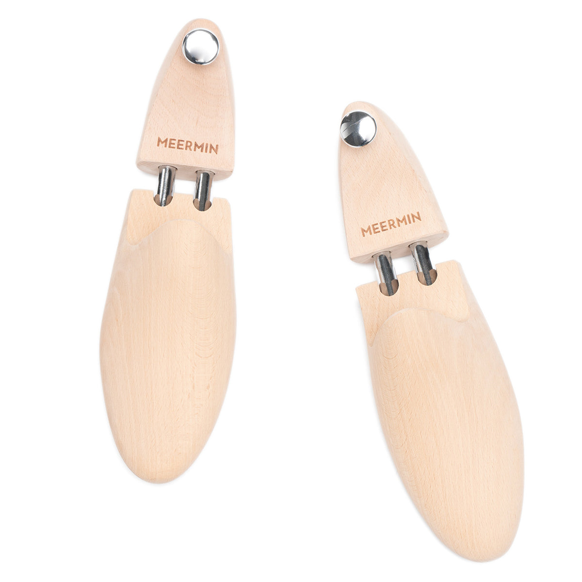 Pair of Meermin natural beechwood shoe trees with chrome knob handles, top-down view showing split toe and heel sections