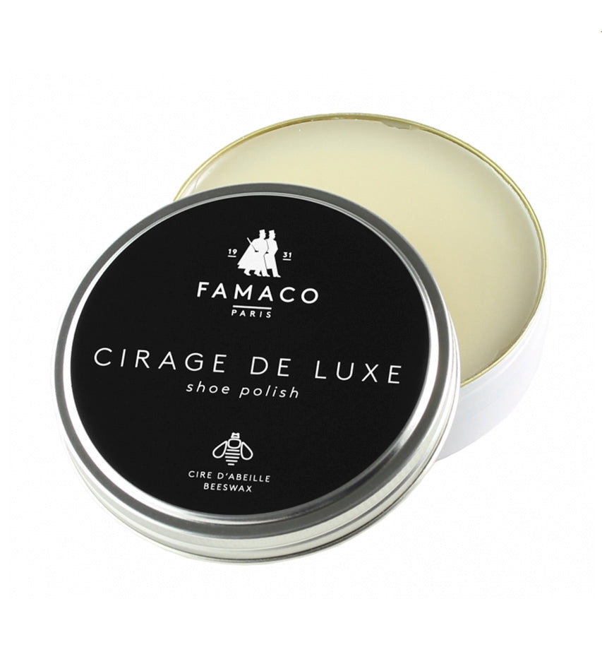 Famaco Cirage de Luxe neutral shoe polish tin, open lid resting beside container, showing pale beeswax cream inside