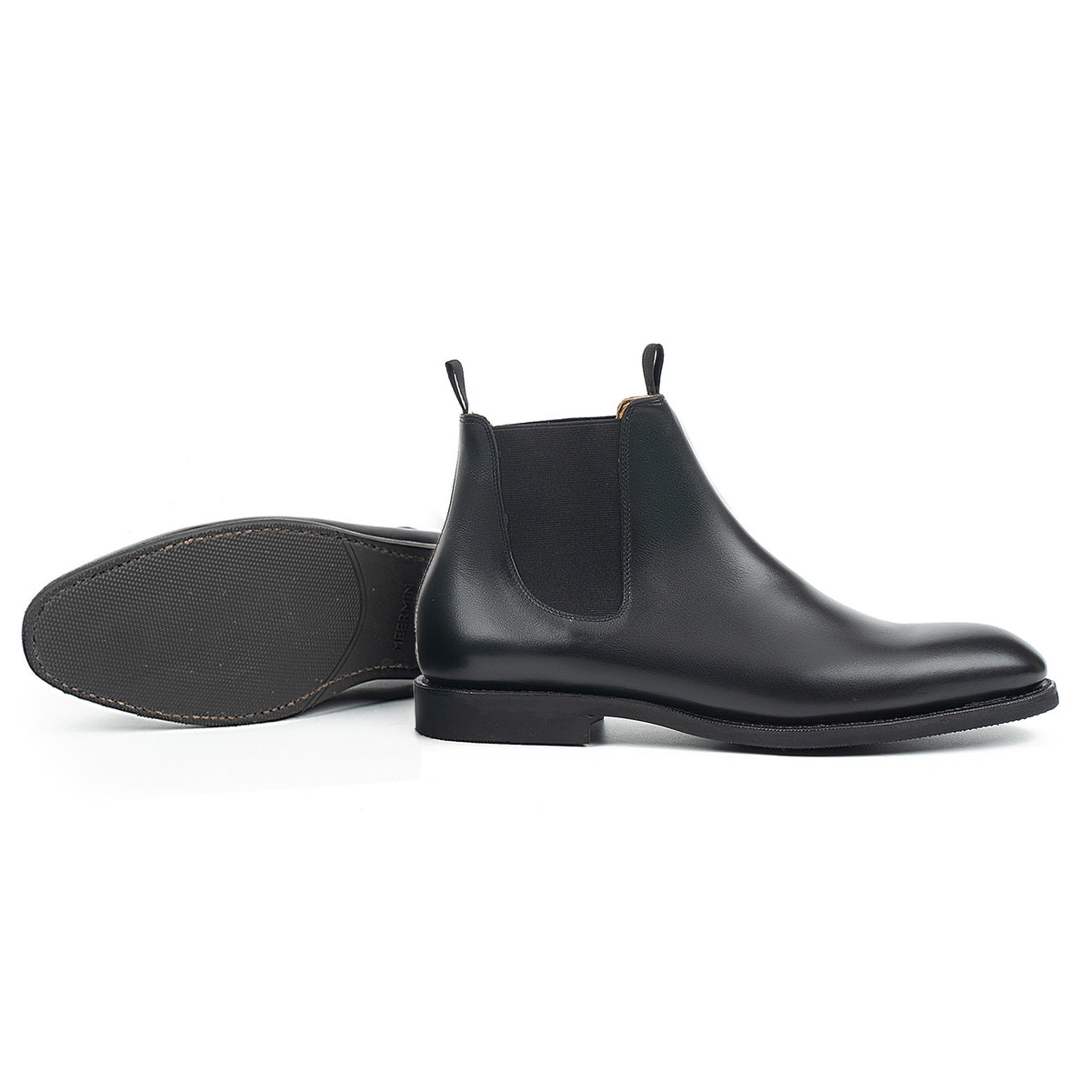 Meermin black silkcalf Chelsea boots, side profile pair with one sole shown, revealing the diamond latex rubber outsole