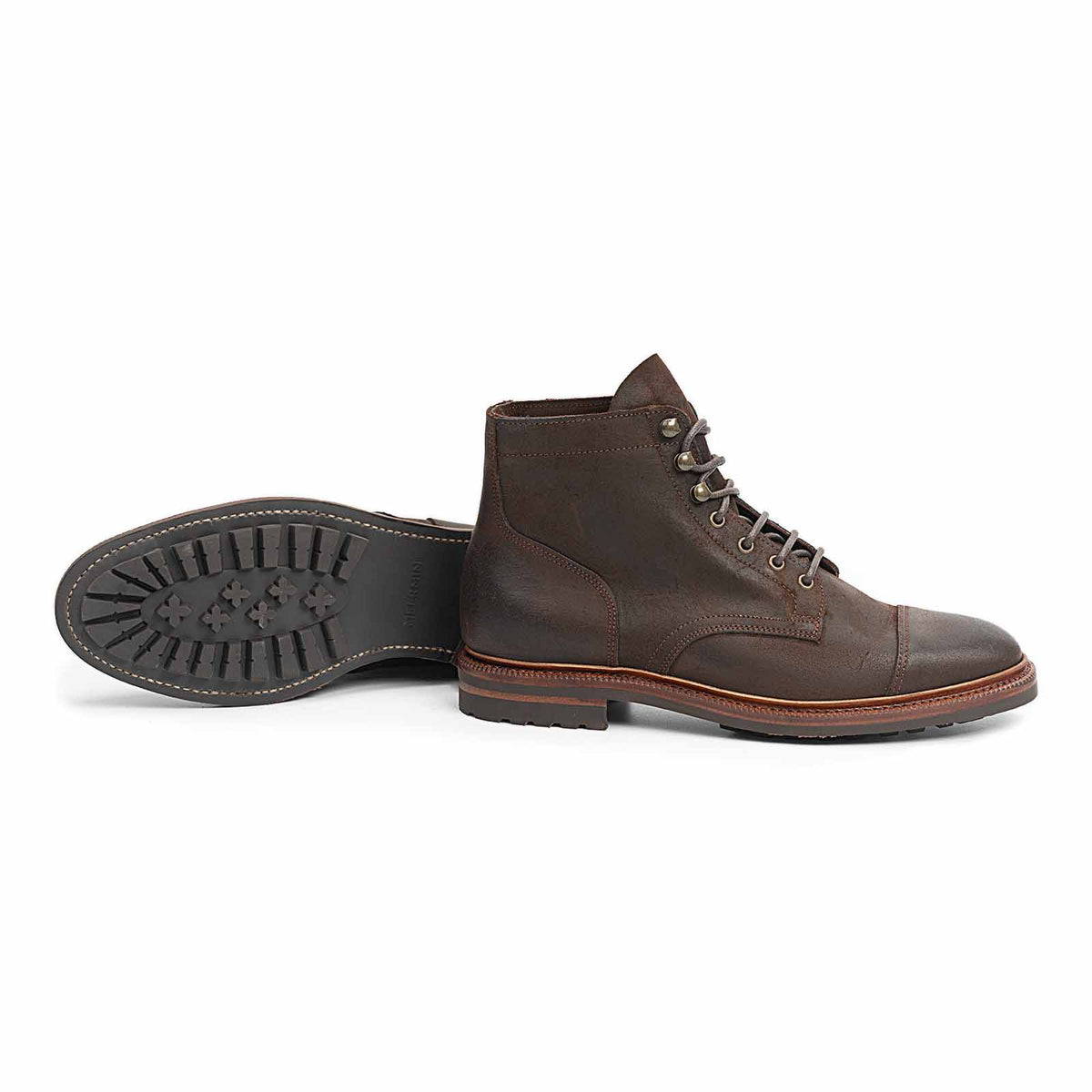 Meermin waxy commander cap-toe boot in rust suede, side profile paired with matching sole tread view of the other boot