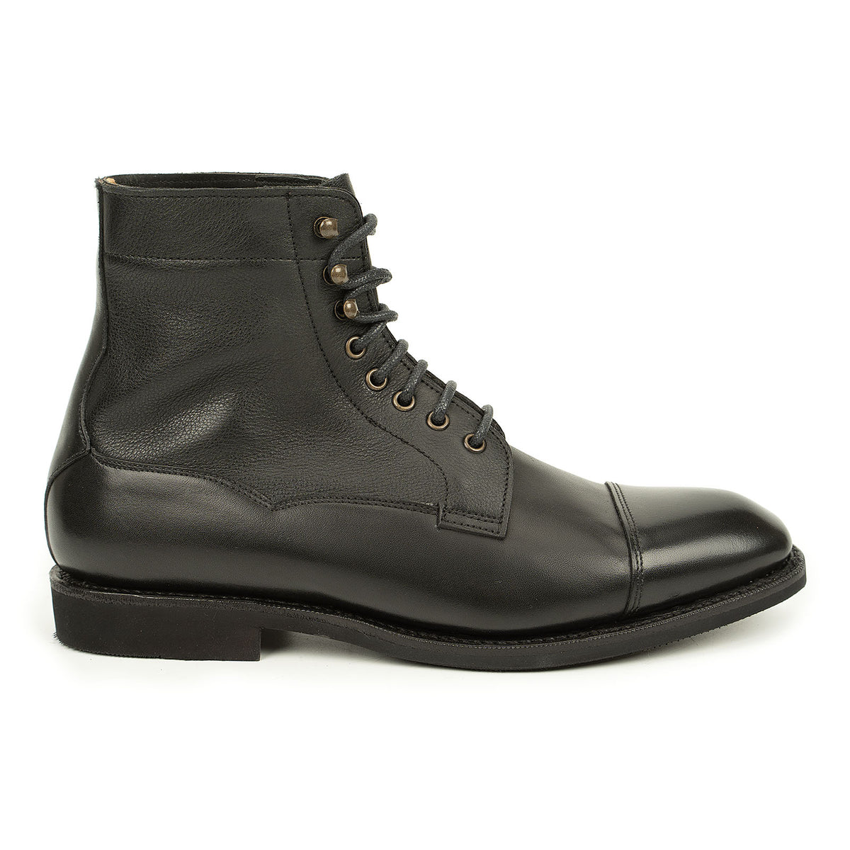 Meermin black cap-toe boot, side profile showing boxcalf vamp, softcalf shaft, lace-up eyelets and diamond latex rubber sole